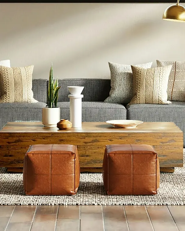 Reclaimed sal wood block coffee table with a stoneware vase and bowl