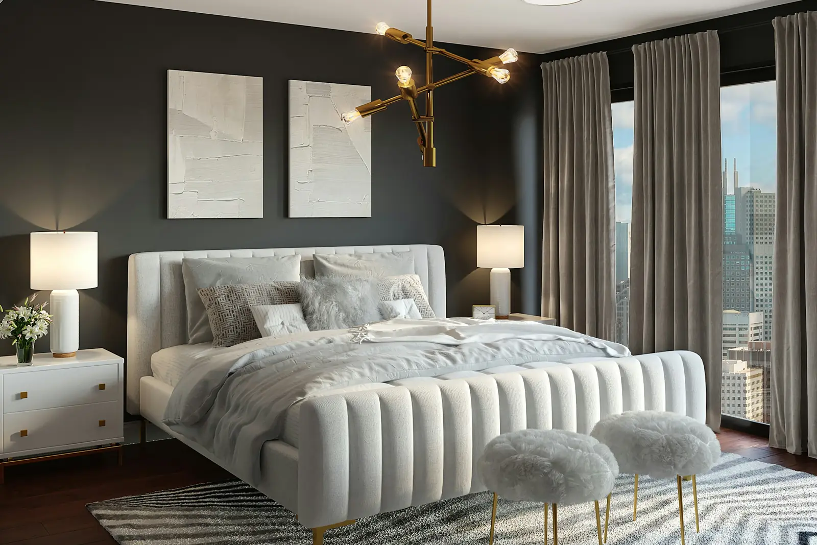 Bedroom with a channel-tufted white bed, gold pendant and grey walls